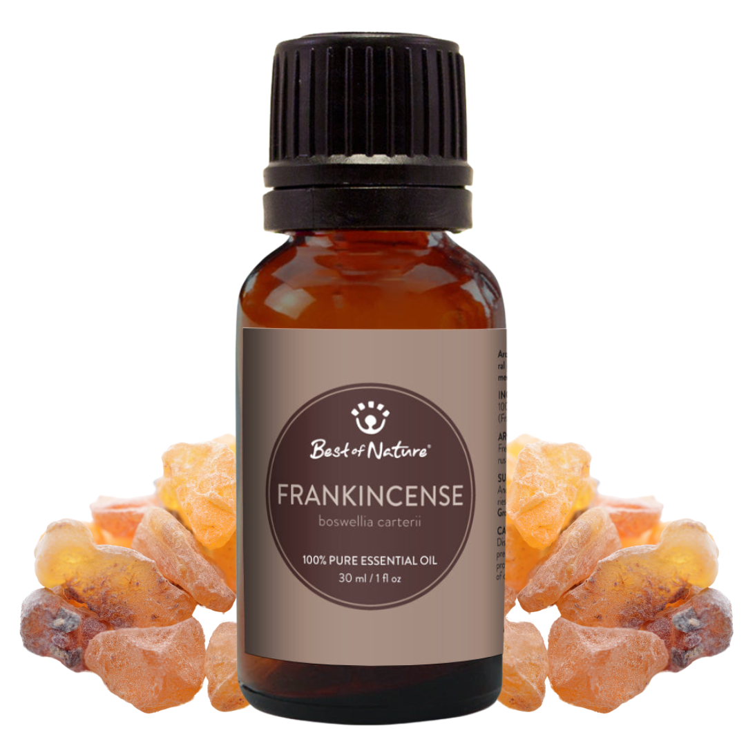 Bottle of Frankincense essential oil with frankincense resin on a white background